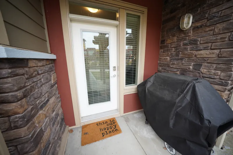 Private patio entry at a Strand ground-floor home
