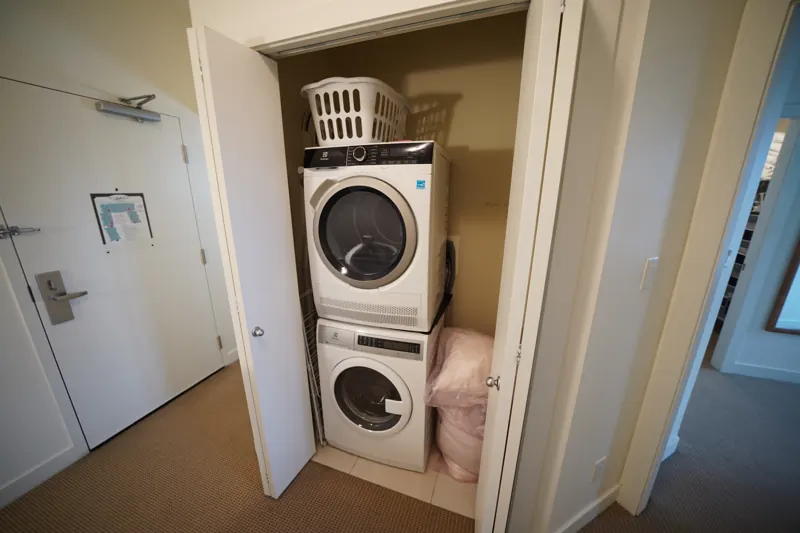 In-suite stacked washer and dryer