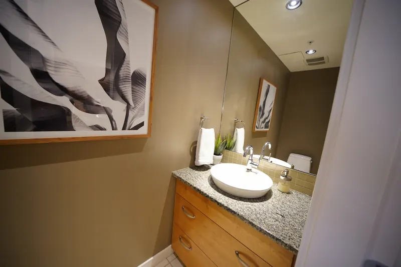 Powder room vanity in a Strand condo